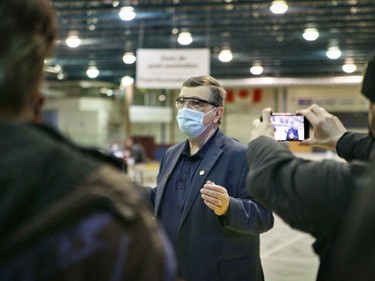 Eastern Ontario Health Unit medical officer of health Paul Roumeliotis tours the Rockland vaccination facility on Friday, March 19, 2021 in Rockland, Ont. Jordan Haworth/Cornwall Standard-Freeholder/Postmedia Network