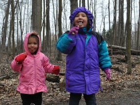 Chloe and Isabelle Steenkamer were quite happy with the maple sweets they managed to get their hands on during the South Nation Conservation's Maple Weekend at the Oschmann Forest Conservation area on Saturday March 27, 2021 in Cornwall, Ont. Francis Racine/Cornwall Standard-Freeholder/Postmedia Network
