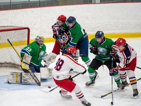 Hawkesbury Hawks goaltender Connor MacKenzie eyes a rebound that Cornwall Colts Jake Rozzi (No. 88) is trying to get a stick on during a developmental scrimmage game on Friday February 26, 2021 in Cornwall, Ont. Hawkesbury won 5-4 in OT. Robert Lefebvre/Special to the Cornwall Standard-Freeholder/Postmedia Network