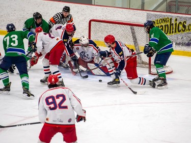 It's a goal-mouth scramble for a rebound in front of Cornwall Colts goalie Jackson Parsons during play against the Hawkesbury Hawks on Friday March 5, 2021 in Cornwall, Ont. The Hawks won 4-2. Robert Lefebvre/Special to the Cornwall Standard-Freeholder/Postmedia Network
