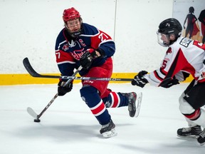 Char-Lan Rebels captain Joseph Samson, left, keeps an eye on Winchester Hawks Graeme Buffon's stick during play on Saturday March 6, 2021 in Williamstown, Ont. The Hawks won 9-1. Robert Lefebvre/Special to the Cornwall Standard-Freeholder/Postmedia Network