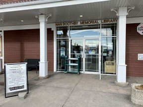 While the Cochrane Public Library has reopened their physical space to the public, the curbside pickup option remains. Patrick Gibson/Cochrane Times