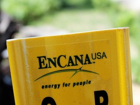A yellow Encana natural gas pipeline marker is seen in this file photo taken in Kalkaska, Mich., June 20, 2012.