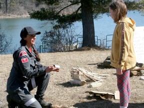 Huron and Area Search and Rescue (HASAR) hosted a pair of adventure days at Morrison Dam outside Exeter on March 20-21. The days provided a chance for families to enjoy the outdoors and learn basic survival skills from HASAR members. Above, HASAR's Christina McMichael talks to Anya Verhulp of Listowel about fires. Scott Nixon