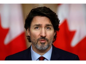 Canada's Prime Minister Justin Trudeau takes part in a news conference, as efforts continue to help slow the spread of the coronavirus disease (COVID-19), in Ottawa, Ontario, Canada February 19, 2021. REUTERS/Blair Gable ORG XMIT: GGG-OTW106