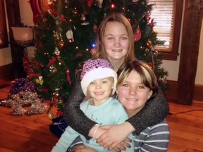 Maria, Dawn and Deidra Garrah at their home in Verona in 2017.