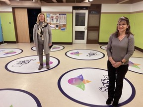 Kim Sledz, Lennox and Addington Seniors Outreach Services program director, and Sabrina Charlton, Seniors Centres Without Walls program co-ordinator, stand in the Seniors Outreach Services recreation room in Napanee on Tuesday.