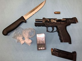 About 13 grams of cocaine and a loaded handgun were found by Ontario Provincial Police in a vehicle on Friday, March 19, 2021.