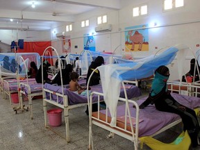 Children suffering from malnourishment receive treatment at a centre in Yemen's northern Hajjah province on March 21, 2021.