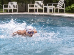 Maggie Mac Neil, who trained in the summer in her backyard pool at her London home while pools were closed because of the COVID-19 pandemic, was named the top swimmer at the Big Ten championships for the second straight year. Mac Neil won three individual events and also led the Michigan Wolverines team to gold in the 400-year free relay at the NCAA meet last week. (Mike Hensen/The London Free Press)