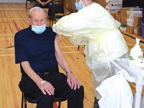 Photo by KEVIN McSHEFFREY/THE STANDARD
Harley Hampel, age 93, received his first COVID-19 Pfizer-BioNTech vaccination on Thursday, March 11 at the Collins Hall. He received his vaccination from Cindy Mathison, a nurse at the Elliot Lake Family Health Team.