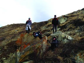 1st Nanton Scouts recently explored Pine Coulee. From left are Chayden Clemons, Landen Smith, Dason Clemons (standing), and Dylan Smith.