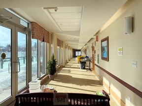 The corridor outside the community centre at Miramichi Lodge is a restricted area as the auditorium was transformed into the COVID Care Centre, after a COVID-19 outbreak was declared at the long-term care home Feb. 22.