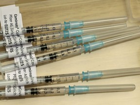 Syringes containing Pfizer-BioNTech COVID-19 vaccine.
REUTERS/Arnd Wiegmann/File Photo ORG XMIT: FW1

NARCH/NARCH30