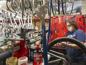 Brian Forcey, owner of CyclePath on Richmond Street in London, says they are sold out of bikes, with the "phone ringing off the hook" as more and more people seek to get outside and get active. Mike Hensen/Postmedia Network