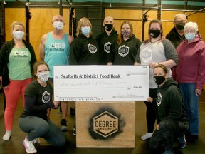 Degree Fitness Seaforth recently took part in the CrossFit Open and raised $615 for the Seaforth and District Food Bank. Pictured in front from left are Degree team members Kelly Miller and Larissa Jenkins, while back from left are Degree team members Willemien Katerberg, Ray Chartrand, Mary Jane Greidanus, James Wilbee, Mairead Russell and Sarah Broadfoot with food bank volunteer co-ordinator Rich Springall and food bank chairperson Lois Scoins. Scott Nixon