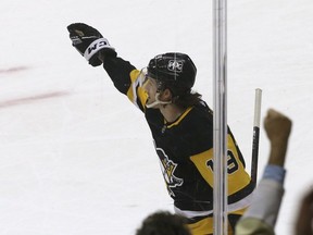 Pittsburgh Penguins centre Jared McCann reacts after scoring a goal against the New York Islanders Monday during the first period at PPG Paints Arena.