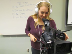File photo/The Observer Julia Soetemans is shown in this file photo trying out a camera during a previous youth film training workshop in Sarnia offered as part of the Lambton Youth Short Film Competition. A series of virtual workshops are planned this year.