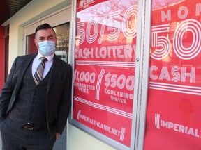 Executive director Brian Austin Jr. stands outside the Imperial Theatre in downtown Sarnia. A successful online monthly 50-50 draw is helping the not-for-profit live entertainment venue weather the pandemic lockdown.