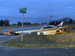 A canine unit was called in after a white car crashed into a hydro pole shortly before 4 a.m. near the intersection of Churchill Line and Marthaville Road. (Lambton OPP/Twitter)