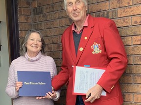 Members of the Rotary Club of Norfolk Sunrise surprised Cathy Harrop of Simcoe with a Paul Harris Fellowship this weekend. Doing the honours was fellow Rotarian Peter Wheatley of Simcoe.