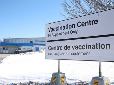 A sign has recently been erected at the entrance to Carmichael Arena advising community members that the location is a vaccination centre in Sudbury, Ont. John Lappa/Sudbury Star/Postmedia Network