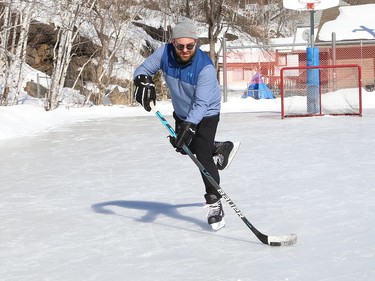 Shane Keegan, who recently moved to Canada from Ireland, has spent about two months learning to skate and play hockey while in Sudbury, Ont. He's been working on his skating and hockey skills by visiting different outdoor rinks, including Eyre Playground on Thursday March 4, 2021. John Lappa/Sudbury Star/Postmedia Network
