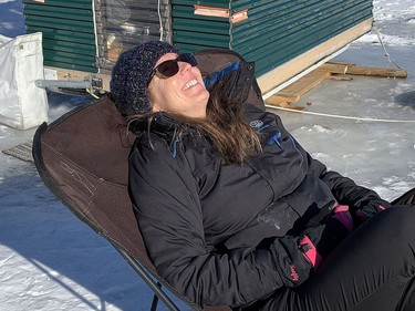 Kate Barber relaxes while catching some rays on Ramsey Lake in Sudbury, Ont. on Sunday March 7, 2021. John Lappa/Sudbury Star/Postmedia Network
