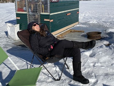 Kate Barber relaxes while catching some rays on Ramsey Lake in Sudbury, Ont. on Sunday March 7, 2021. John Lappa/Sudbury Star/Postmedia Network