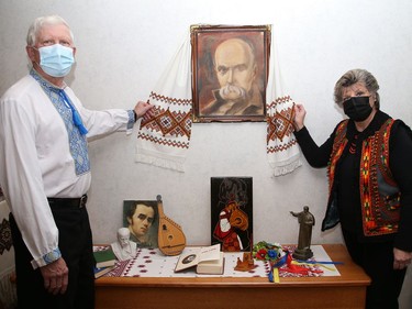 Taras Martyn, left, and Halia Buba prepare a display at the Ukrainian Seniors' Centre in Sudbury, Ont. on Wednesday March 10, 2021, to celebrate the 207th anniversary of the birth of Ukraine's national poet, Taras Shevchenko, who was born on March 9, 1814. The exhibit will be on display for the month of March. John Lappa/Sudbury Star/Postmedia Network