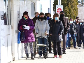 People attend a vaccination clinic at Carmichael Arena in Sudbury, Ont. on Thursday March 11, 2021. John Lappa/Sudbury Star/Postmedia Network