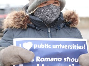 Debbie Ladd participates in a demonstration outside Minister of Colleges and Universities Ross Romano's constituency office on Thursday, March 11, 2021 in Sault Ste. Marie, Ont. Demonstrators want Romano to support Laurentian University. The post-secondary institution is in creditor protection. (BRIAN KELLY/POSTMEDIA NETWORK)