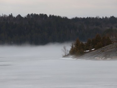 Fog wraps around the shoreline of Simon Lake in Naughton, Ont. on Wednesday March 24, 2021. John Lappa/Sudbury Star/Postmedia Network