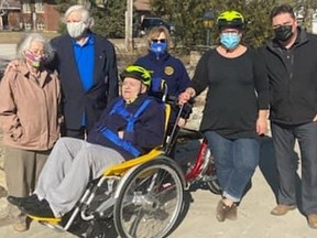 Members of the Rotary Club of Watford drop off a new three-wheel tandem bike at the Watford Quality Care Centre. From left are: Martha McLaren, Rotary president Noel McLaren, Rotarian Fran Woods, program director Anita Best and Andy from Action Health Care Inc. Sitting in the wheelchair is resident Ron Tree. Handout/Sarnia This Week