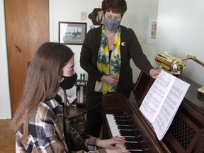Mari Luhta, a local level seven piano student, is seen here receiving instruction from Lynn Pigeon, who is a registered music teacher and the president of the Ontario Registered Music Teacher’s Association for Timmins branch. Luhta is preparing to participate in the upcoming virtual Porcupine Music Festival de musique this year. 

RICHA BHOSALE/The Daily Press