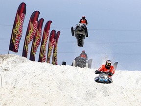 Cameron Wachtler soars above Dallas Ruff-Robertson as he races to the finish line during the Pro Snowcross Pro Lite race that was held in Timmins on March 7, 2020. Timmins was scheduled to host two days of racing this upcoming weekend but the Canadian Snowcross Racing Association was forced to cancel in order to comply with the COVID-19 safety zone protocols.

The Daily Press file photo