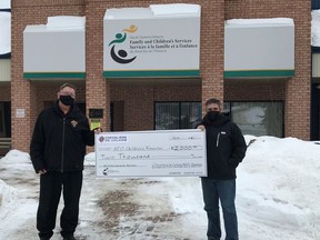 Paul Ethier, right, director of corporate services of NEOFACS, accepted a cheque on behalf of the North Eastern Ontario Children's Foundation from Émilien Charlebois, Député Grand Chevalier (Grand Knight) of the Chevaliers de Colomb, at the NEOFACS head office in  Timmins this week.

Supplied
