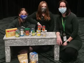 O'Gorman High School Grade 9 students Madison Taillefer-Malette, left, and Paige Bachmeier were with Shannon Johns, who is a Grade 9 religion class teacher at the school, as Johns is spearheading a food drive at the school from March 22 to 25 in support of the Timmins Food Bank.  

Supplied