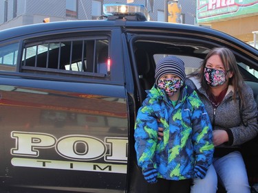 Five-year-old Anthony Bedard and his grandmother Tanja take a seat in the Timmins Police cruiser that was on display at the Urban Park in Downtown Timmins on Saturday.

RON GRECH/The Daily Press