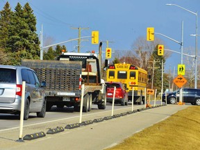 Bike lanes similar to the one on Main Street in Port Dover between St. Cecilia's School and the No Frills grocery store are coming to a busy stretch of Cockshutt Road across town beween Dover Mills Road and Ryerse Crescent. Monte Sonnenberg/Postmedia Network