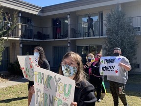 More than 20 people gathered at the Best Western Brant Park Inn on March 20 to thank seasonal farm workers from Jamaica who are in quarantine at the Brantford hotel for 14 days before heading off to work at Norfolk area farms. The workers are just over halfway through their quarantine and a local farm worker advocate decided they needed a bit of a morale boost. Participants wore masks and paraded around the hotel waving signs, the Jamaican flag and playing music. The workers showed their appreciation for the gesture by stepping out to their balconies to acknowledge the cheers. Vincent Ball/Postmedia Network