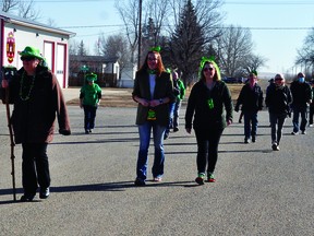 The annual St. Patrick's Day parade in Carmangay went ahead at 11 a.m. on March 17, when about 20 people walked the block from the post office to the Grange Hotel. STEPHEN TIPPER