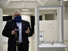 St. Thomas Mayor Joe Preston said giving COVID-19 vaccines at the St. Thomas-Elgin Memorial Arena is the start "of a whole new set of memories" during a tour if the clinic on Thursday. The clinic will administer the first doses of the PfizerBioNTech COVID-19 vaccine on Monday, March 15. (Kathleen Saylors/Postmedia Network)