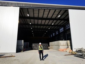 IECS Group Inc. owner Louis Arvai stands outside a new 20,000 square foot facility, which the Rodney business had built to accomodate work on a Metrolinx project.