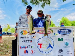 Damian Eade holds up part of his winning catch at a high school tournament in Florida.