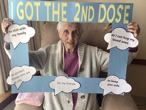 Joy Specker, a resident at Gateway Haven Long-Term Care in Wiarton, celebrates getting the second dose of the COVID-19 vaccine on March 2. More than 200 residents and staff were given the second vaccine dose on March 2 at Bruce County's long-term care homes in Wiarton and Walkerton.