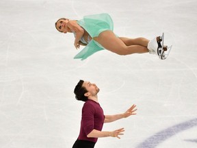 Canada's Kirsten Moore-Towers and Michael Marinaro perform during the pairs free skate at the ISU world figure skating championships in Stockholm, Sweden, on Thursday, March 25, 2021. They finished in sixth place. (Anders Wiklund/TT News Agency via Reuters)