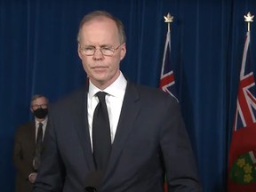 Ontario science table co-chair Dr. Adalsteinn Brown speaks during a news conference in Toronto Thursday. In the background is chief medical officer Dr. David Williams. YouTube/The Intelligencer/Postmedia Network