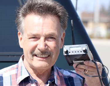 Ricci Burton holds a transmitter used to broadcast the rosary over radios on Saturday, April 3, 2021 in Sault Ste. Marie, Ont. (BRIAN KELLY/THE SAULT STAR/POSTMEDIA NETWORK)
