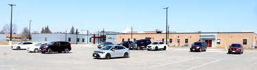 Gathering at St. Basil Catholic School to pray the rosary during the COVID-19 pandemic on Saturday, April 3, 2021 in Sault Ste. Marie, Ont. (BRIAN KELLY/THE SAULT STAR/POSTMEDIA NETWORK)